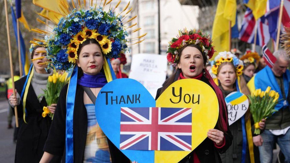 Some of the people taking part in the march to Trafalgar Square to mark second anniversary of Russia invading Ukraine